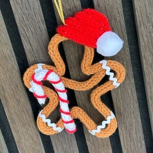 Festive Gingerbread Ornament with Santa Hat